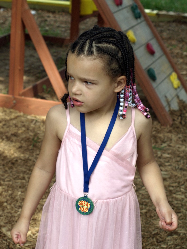 Wearing Her Graduation Medallion Wearing Her Graduation Medallion